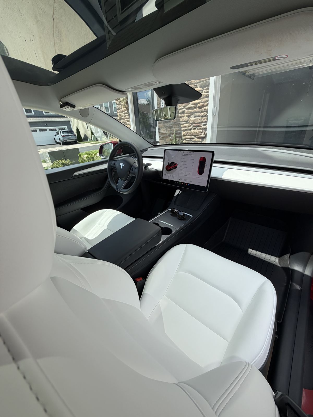 Tesla Model Y interior from the rear seat after detailing